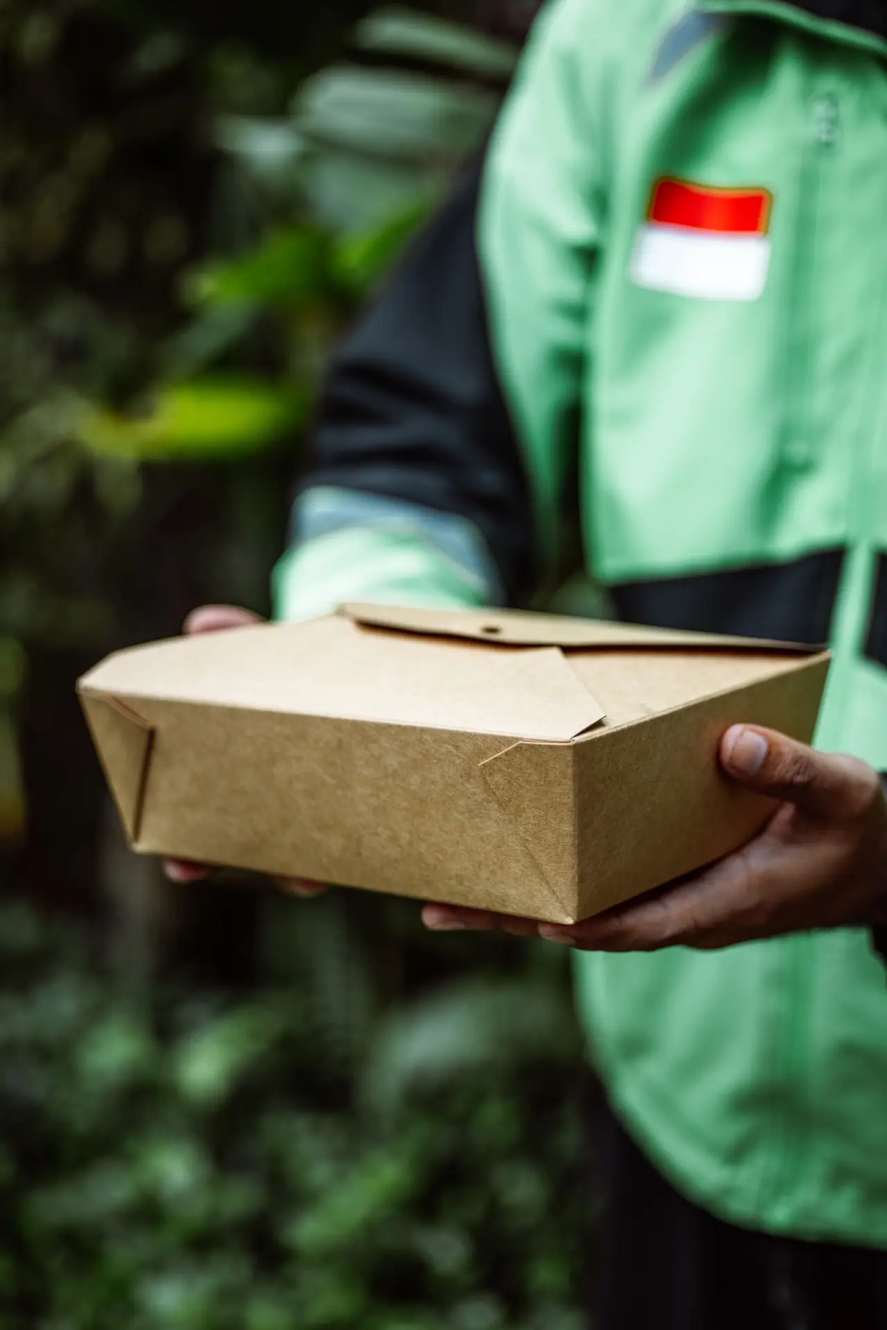 Kraft paper food box held in both hands
